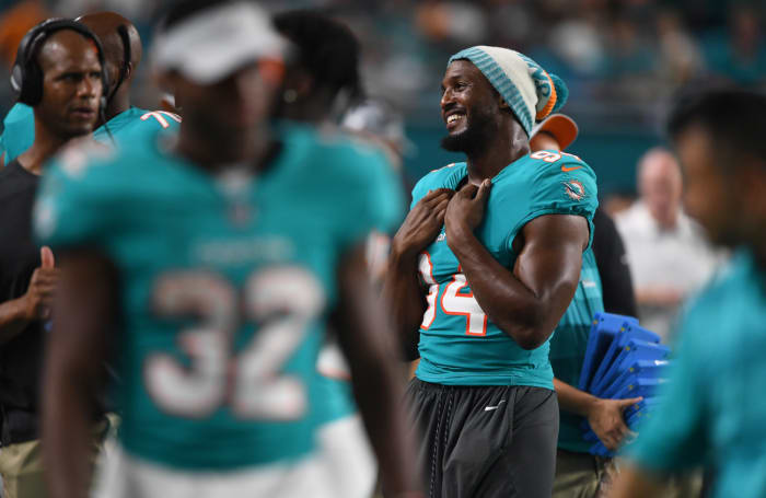 robert-quinn-sideline-dolphins.jpg