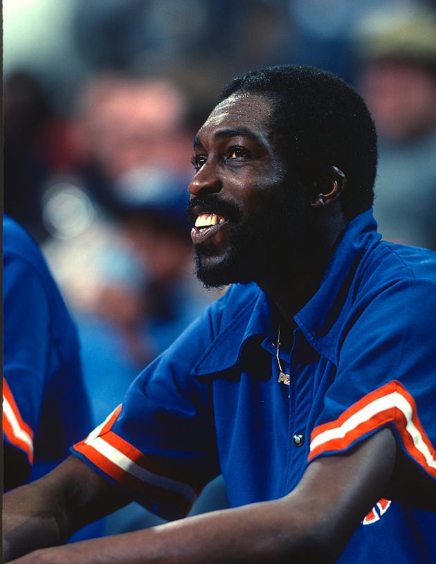 Earl Monroe of the New York Knicks looks on from the bench against the Washington Bullets during an game in 1977 at the Capital Centre in Landover, Maryland. Monroe played for the Knickers from 1971-80.