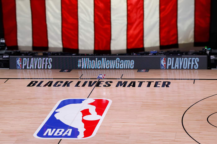 An empty court and bench is shown following the scheduled start time in Game Five of the Eastern Conference First Round between the Milwaukee Bucks and the Orlando Magic during the 2020 NBA Playoffs
