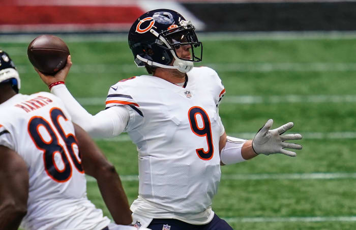 Chicago Bears quarterback Nick Foles (9) passes against the Atlanta Falcons during the third quarter at Mercedes-Benz Stadium.