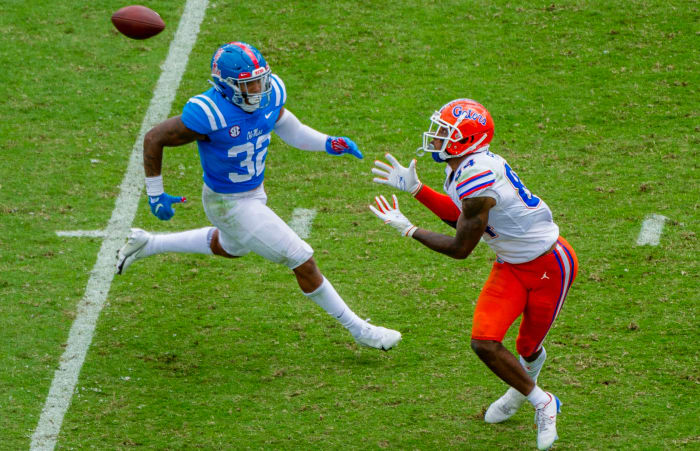Florida Gators tight end Kyle Pitts (84) catches a pass against Mississippi Rebels linebacker Jacquez Jones (32) during the second half at Vaught-Hemingway Stadium.