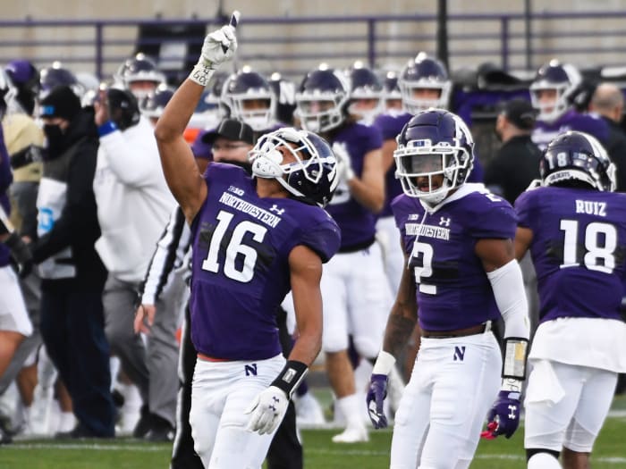 Northwestern Wildcats defensive back Brandon Joseph (16) gestures after intercepting the Wisconsin Badgers during the first half at Ryan Field