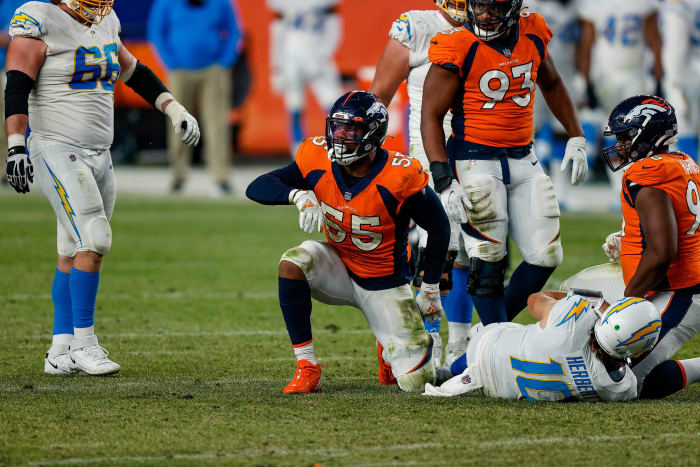 Denver Broncos outside linebacker Bradley Chubb (55) after tackling Los Angeles Chargers quarterback Justin Herbert (10) in the fourth quarter at Empower Field at Mile High.