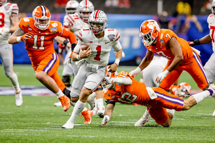 Ohio State QB Justin Fields runs during the playoff semifinal