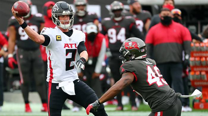 Jan 3, 2021; Tampa, Florida, USA; Atlanta Falcons quarterback Matt Ryan (2) throws the ball as Tampa Bay Buccaneers linebacker Cam Gill (49) pressures during the second half at Raymond James Stadium.