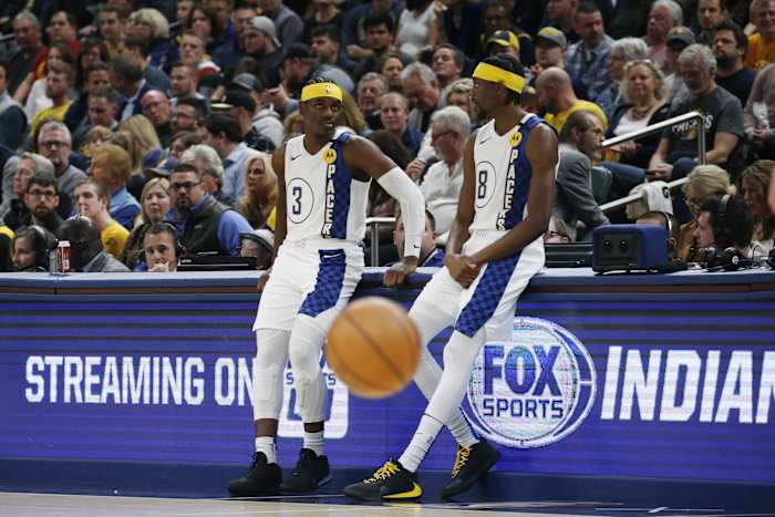 Brothers Aaron and Justin Holiday are Indiana teammates.