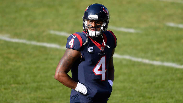 Deshaun Watson walks off the field during a game against the Bears