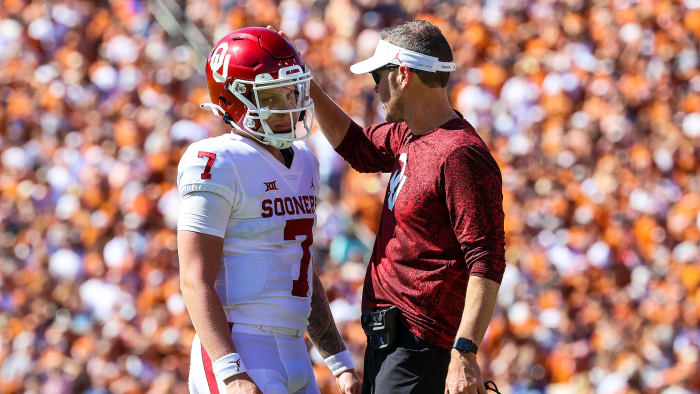 Spencer Rattler and Lincoln Riley during the Red River showdown