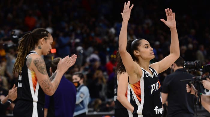 Phoenix Mercury center Brittney Griner and guard Skylar Diggins-Smith celebrate after beating the Chicago Sky in Game 2 of the 2021 WNBA Finals