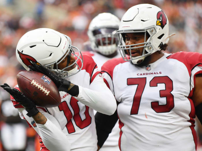 Arizona Cardinals wide receiver DeAndre Hopkins (10) celebrates with guard Max Garcia (73) after catching a touchdown pass during the first half against the Cleveland Browns at FirstEnergy Stadium.