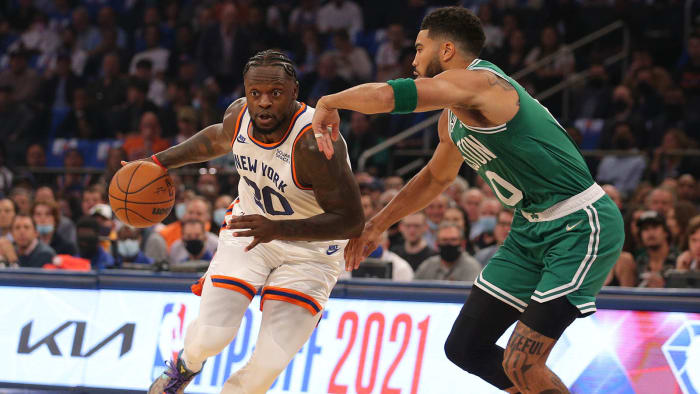New York Knicks forward Julius Randle drives to the basket against Boston Celtics forward Jayson Tatum.