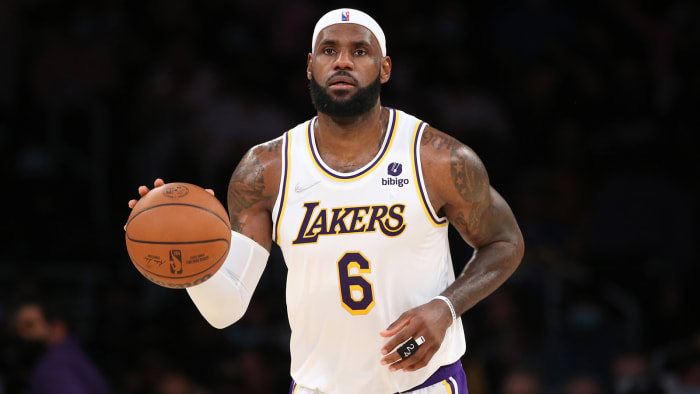 Los Angeles Lakers forward LeBron James dribbles a ball during the game against the Memphis Grizzlies.