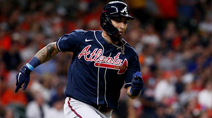 Oct 26, 2021; Houston, TX, USA; Atlanta Braves left fielder Eddie Rosario hits a double against the Houston Astros during the seventh inning in game one of the 2021 World Series at Minute Maid Park.