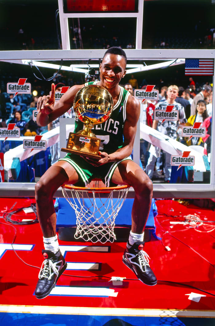 Dee Brown celebrates after winning dunk contest