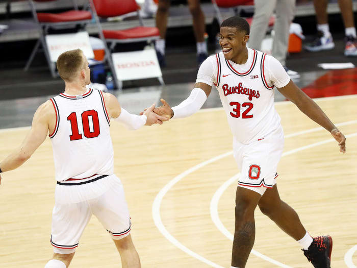 Ohio State's Justin Ahrens and E.J. Liddell