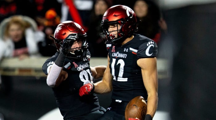 Cincinnati Bearcats wide receiver Alec Pierce (12) celebrates with Cincinnati Bearcats tight end Josh Whyle (81) after scoring a touchdown in the second half of the NCAA football game Saturday, November ...