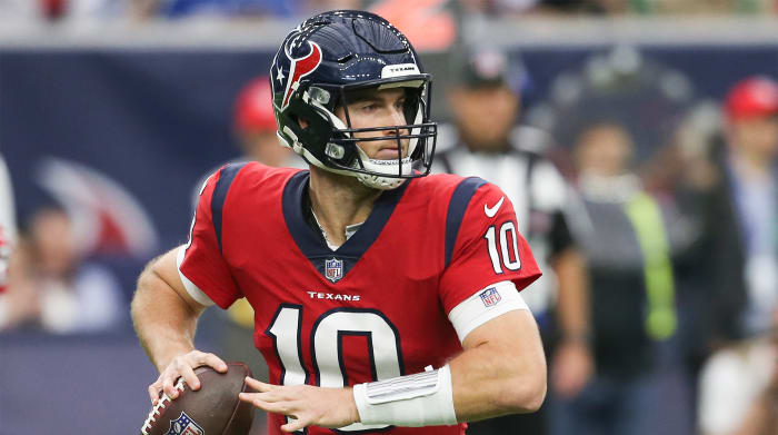 December 5, 2021;  Houston, Texas, United States;  Houston Texans quarterback Davis Mills (10) battles the Indianapolis Colts in the second half at NRG Stadium.  Indianapolis Colts won 31-0.