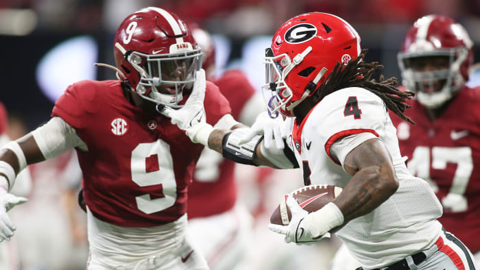 Georgia's James Cook runs vs. Alabama