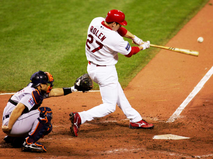 Oct 26, 2006; St. Louis, MO, USA; St. Louis Cardinals third baseman Scott Rolen hits a double during the 6th inning of game 4 of the World Series against the Detroit Tigers at Busch Stadium in St. Louis, Missouri.