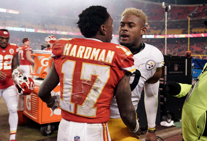 Jan 16, 2022; Kansas City, MO, USA; Kansas City Chiefs wide receiver Mecole Hardman (17) and Pittsburgh Steelers wide receiver JuJu Smith-Schuster (right) embrace following the AFC Wild Card playoff football game at GEHA Field at Arrowhead Stadium. Mandatory Credit: Denny Medley-USA TODAY Sports