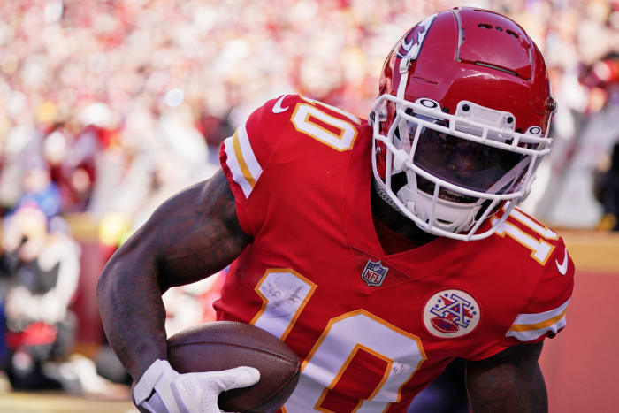 January 30, 2022;  Kansas City, Missouri, USA;  Kansas City Chiefs wide receiver Tyreek Hill (10) catches for a touchdown against the Cincinnati Bengals during the first quarter of the AFC Championship game at GEHA Field at Arrowhead Stadium.  Mandatory Credit: Denny Medley - USA TODAY Sports