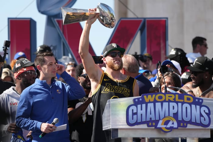 Feb 16, 2022; Los Angeles, CA, USA; Los Angeles Rams receiver Cooper Kupp holds the Vince Lombardi trophy during the Super Bowl LVI championship rally at the Los Angeles Memorial Coliseum. Mandatory Credit: Kirby Lee-USA TODAY Sports