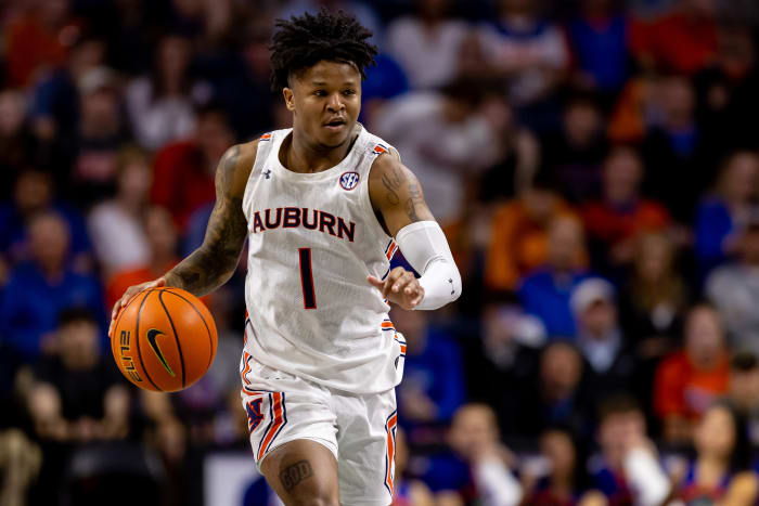 Feb 19, 2022; Gainesville, Florida, USA; Auburn Tigers guard Wendell Green Jr. (1) dribbles the ball during the first half against the Florida Gators at Billy Donovan Court at Exactech Arena. Mandatory Credit: Matt Pendleton-USA TODAY Sports