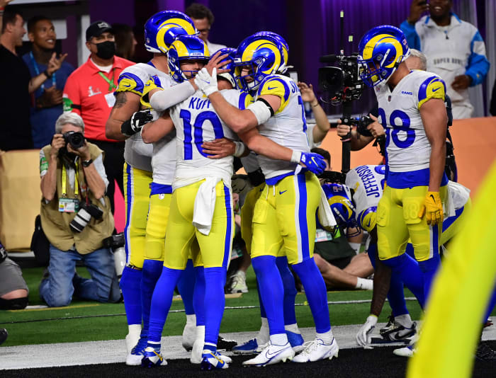 Feb 13, 2022; Inglewood, California, USA; Los Angeles Rams quarterback Matthew Stafford (9) celebrates with receiver Cooper Kupp (10) after scoring a touchdown in the fourth quarter against the Cincinnati Bengals in Super Bowl LVI at SoFi Stadium. Mandatory Credit: Gary A. Vasquez-USA TODAY Sports