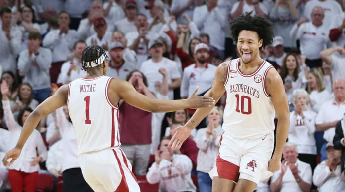 Arkansas Razorbacks guard JD Notae (1) celebrates with forward Jaylin Williams (10) after a score by Williams against the Kentucky Wildcats.