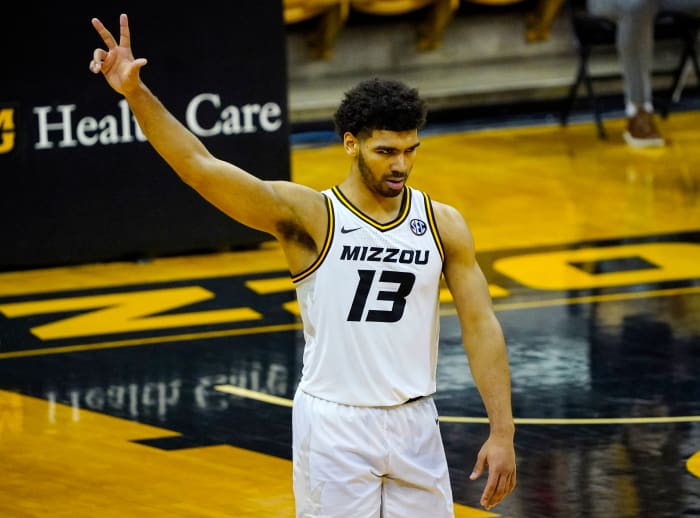 Feb 23, 2021; Columbia, Missouri, USA; Missouri Tigers guard Mark Smith (13) reacts after scoring against the Mississippi Rebels during the second half at Mizzou Arena. Mandatory Credit: Jay Biggerstaff-USA TODAY Sports