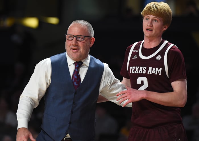 Feb 19, 2022; Nashville, Tennessee, USA; Texas A&M Aggies head coach Buzz Williams talks with guard Hayden Hefner (2) during the first half against the Vanderbilt Commodores at Memorial Gymnasium. Mandatory Credit: Christopher Hanewinckel-USA TODAY Sports