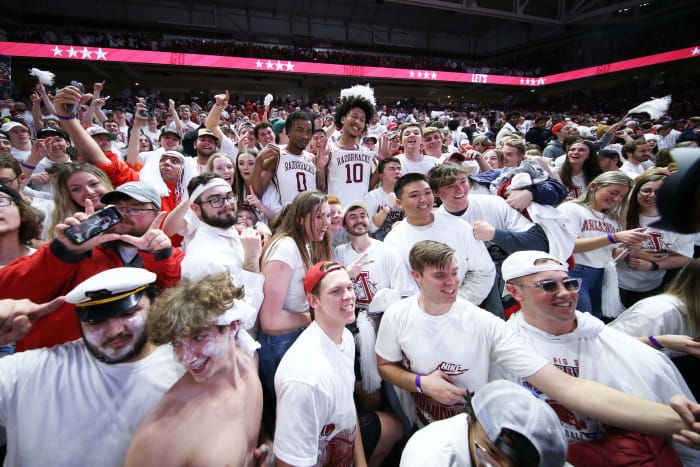 Feb 26, 2022; Fayetteville, Arkansas, USA; Arkansas Razorbacks guard Stanley Umude (0) and forward Jaylin Williams (10) celebrate with the student section after the game against the Kentucky Wildcats at Bud Walton Arena. Arkansas won 75-73. Mandatory Credit: Nelson Chenault-USA TODAY Sports