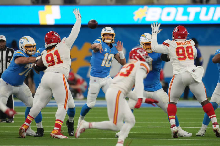 December 16, 2021;  Inglewood, California, USA;  Los Angeles Chargers quarterback Justin Herbert (10) throws a pass against the Kansas City Chiefs in the first half at SoFi Stadium.  Mandatory Credit: Kirby Lee-USA TODAY Sports