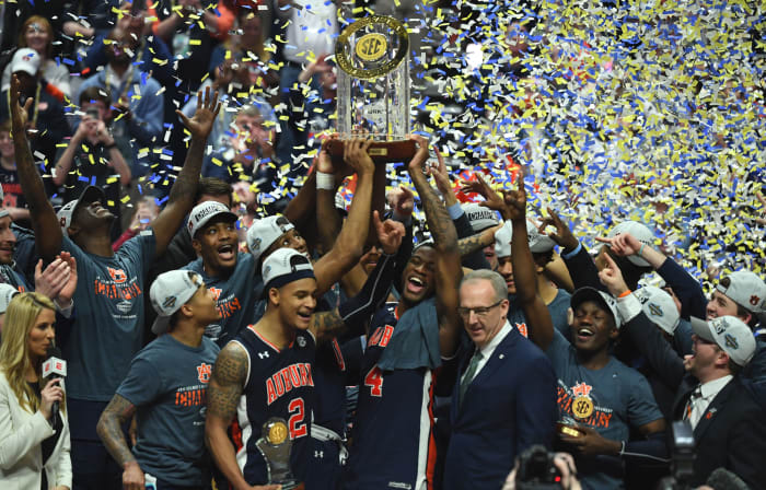 Mar 17, 2019; Nashville, TN, USA; Auburn Tigers celebrates after beating the Tennessee Volunteers in the SEC conference tournament championship game at Bridgestone Arena. Mandatory Credit: Christopher Hanewinckel-USA TODAY Sports