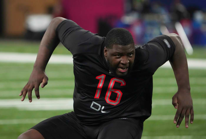 Alabama defensive lineman Phidarian Mathis (DL16) goes through drills during the 2022 NFL Scouting Combine at Lucas Oil Stadium.