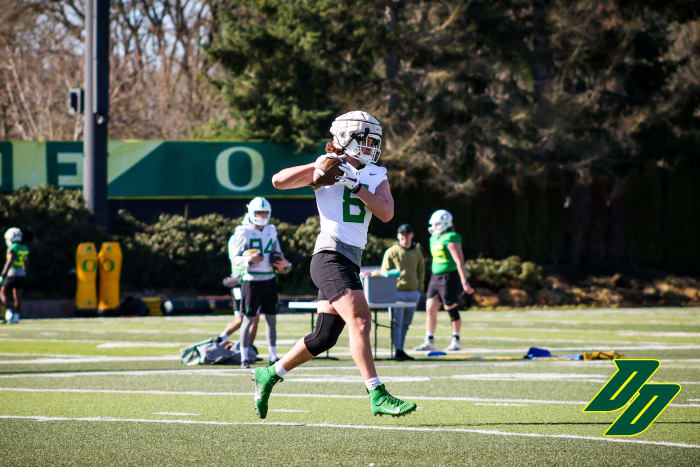 Oregon Ducks tight end Moliki Matavao hauls in a pass during a 2022 spring football practice in Eugene.