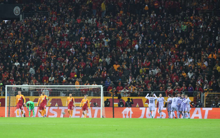 Barcelona players celebrate a goal by Pierre-Emerick Aubameyang in their 2-1 win at Galatasaray