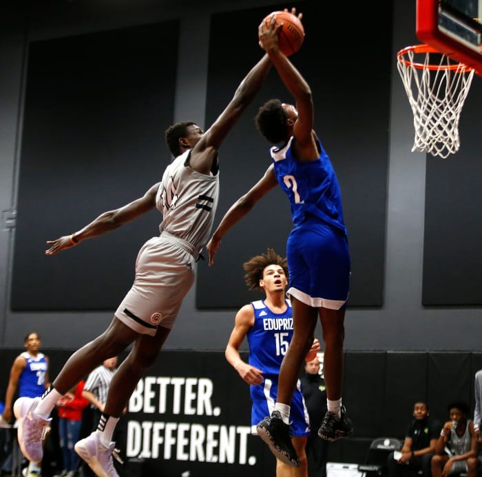 Jan 7, 2021; Phoenix, AZ, USA; Prolific Prep's Yohan Traore (14) attempts to block a dunk from Eduprize Academy's Devontes Cobbs (2) during the first half at the PHHacility basketball gym. Mandatory Credit: Patrick Breen-Arizona Republic Phhacility Basketball Gym