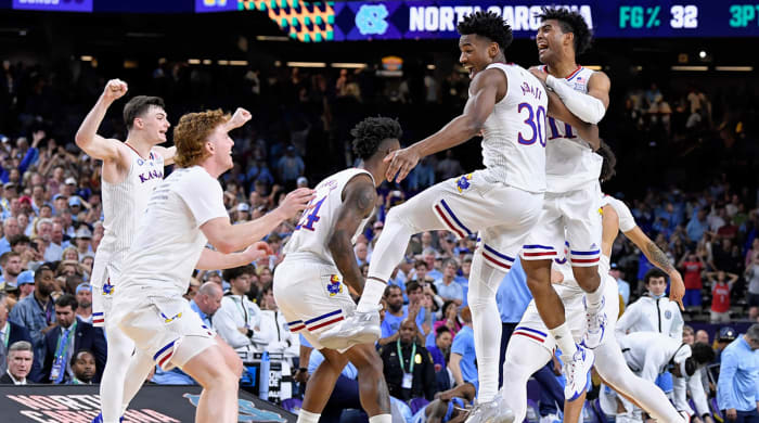 Jayhawks players celebrate their national title.