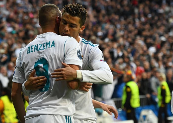 Real Madrid teammates Karim Benzema and Cristiano Ronaldo pictured hugging in 2018