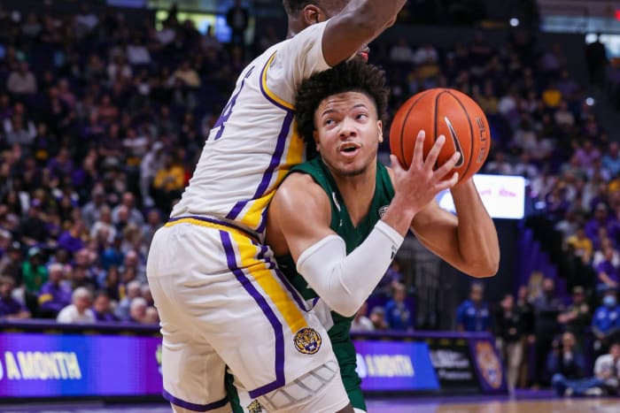 Ohio Bobcats guard Mark Sears (1) drives to the basket against LSU Tigers forward Darius Days (4) in the second half at the Pete Maravich Assembly Center.