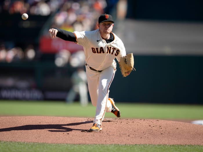 Oct 3, 2021; San Francisco, California, USA;  San Francisco Giants starting pitcher Logan Webb (62) delivers  a pitch against the San Diego Padres during the first inning at Oracle Park.