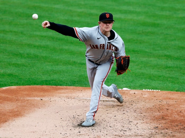 May 17, 2021; Cincinnati, Ohio, USA; San Francisco Giants starting pitcher Logan Webb (62) throws against the Cincinnati Reds during the first inning at Great American Ball Park.