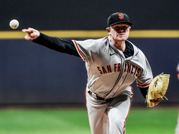 Aug 6, 2021; Milwaukee, Wisconsin, USA; San Francisco Giants pitcher Logan Webb (62) pitches in the first inning against the Milwaukee Brewers at American Family Field.