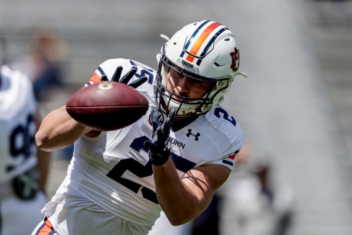 Auburn tight end John Samuel Shenker (25) catches a pass during warmups before the A-Day NCAA spring college football game at Jordan-Hare Stadium, Saturday, April 9, 2022, in Auburn, Alabama.  (AP Photo/Butch Dill)
