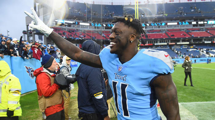 Titans wide receiver A.J. Brown (11) celebrates after a win against the Dolphins.