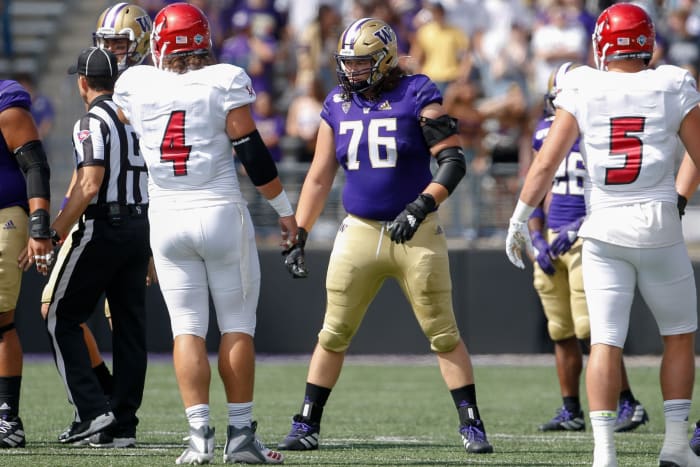 Washington Huskies offensive lineman Luke Wattenberg (76) waits for the snap during the first quarter against the Eastern Washington Eagles at Husky Stadium.