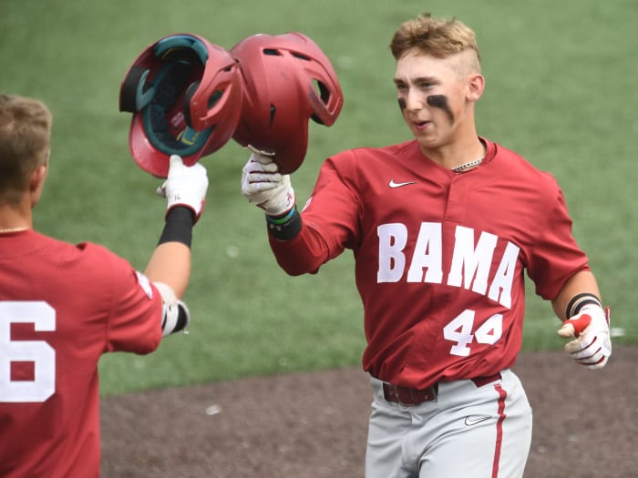Alabama's Zane Denton (44) celebrates with Owen Diodati (16) after Denton hit a home run against Tennessee during the NCAA baseball game in Knoxville, Tennessee on Sunday April 17, 2022