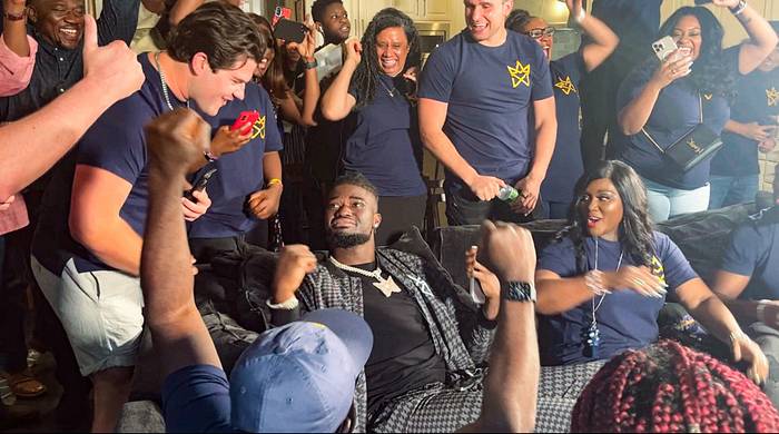 Ojabo enjoyed the draft with friends and family in Houston.