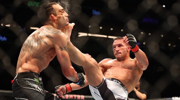 Michael Chandler kicks Tony Ferguson for the knockout during UFC 274 at the Footprint Center
